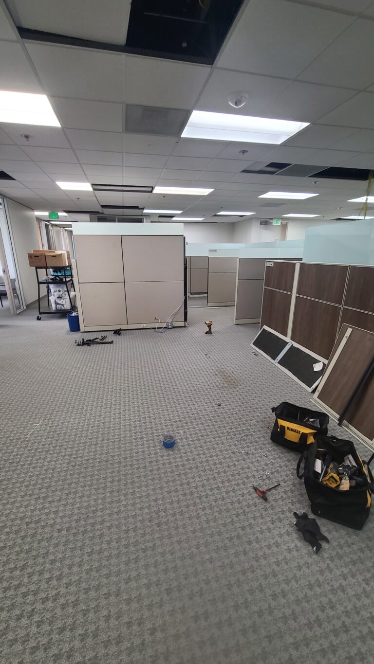 Office cubicles being taken down in Renton