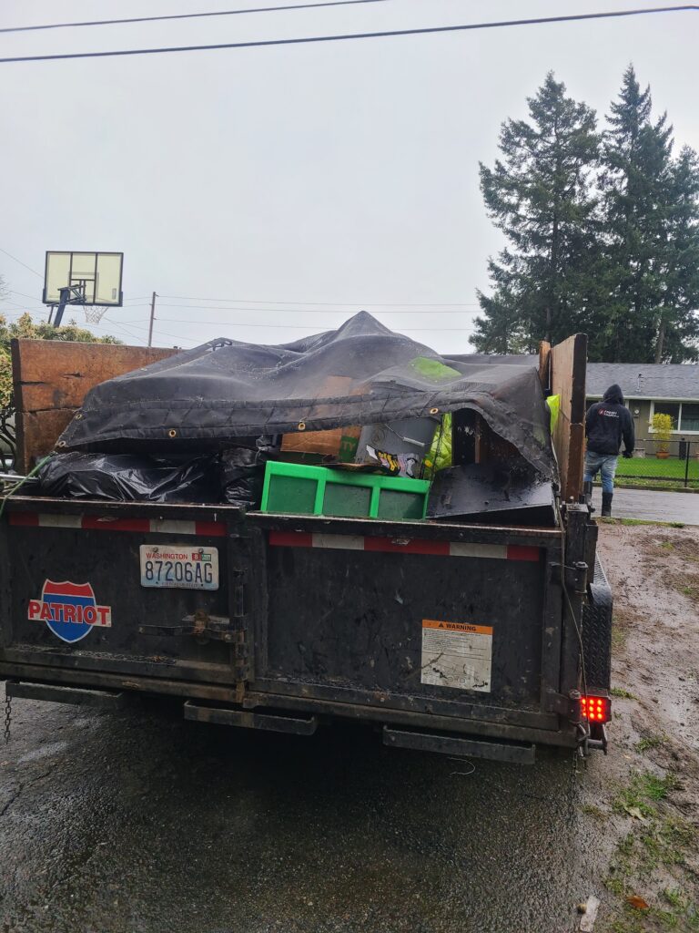 Tarped and secured debris load ready for disposal