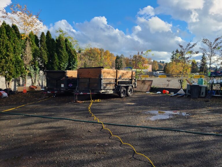 Fresh Family dump trailers staged on a cleanup site