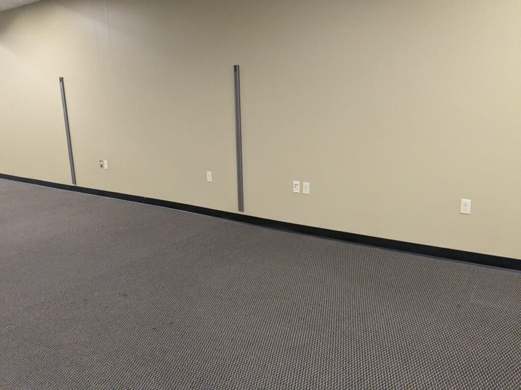 Office wall patched and finished after remodel