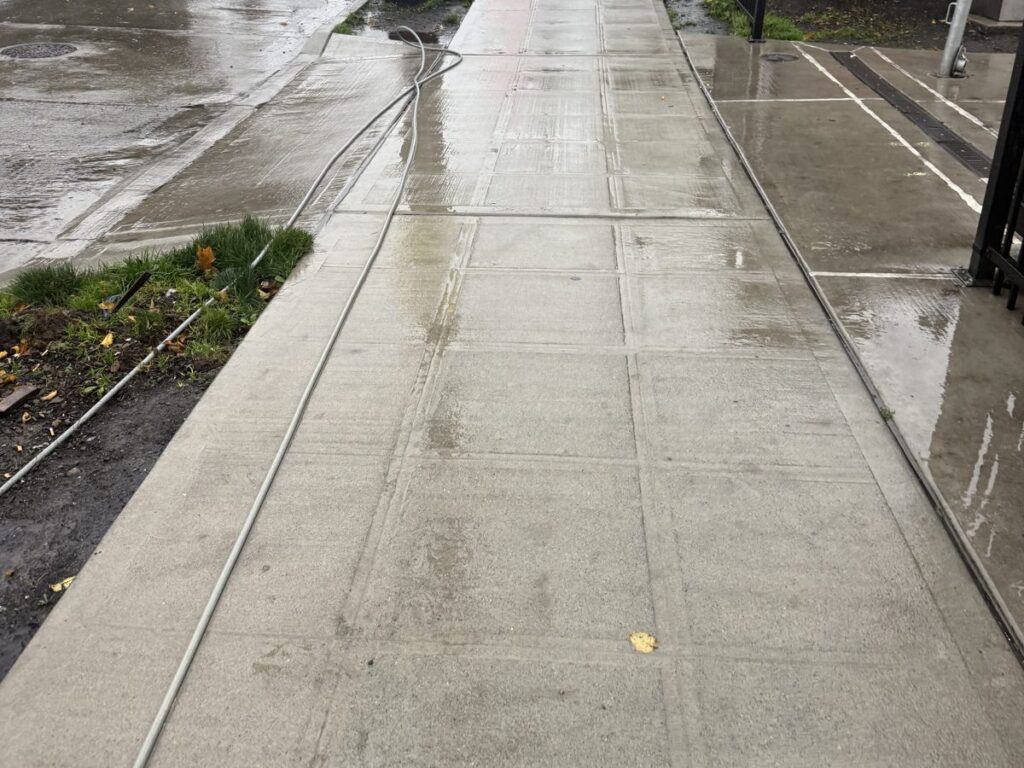 Freshly washed sidewalk near 12th and Jackson in Seattle
