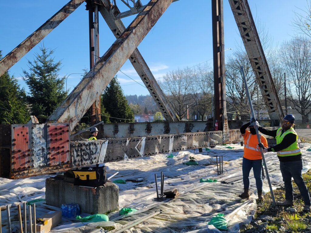 Fresh Family crew at the Puyallup River Bridge truss before removal